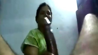 Indian aunty giving cock massage to..