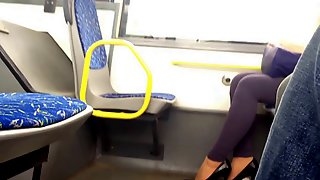 Sexy black highheels in the bus