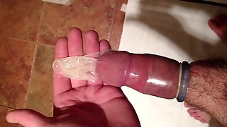 Peeing in a cum condom
