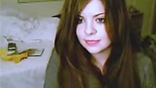 Cute redhead strips clothes to show her..