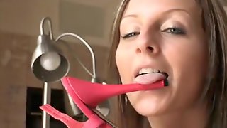 Cutie masturbates with a shoe heel