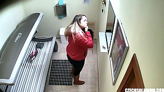 Busty chubby girl relaxing in solarium..