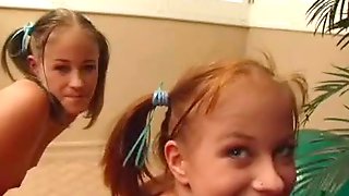 Two young twin girls for a man